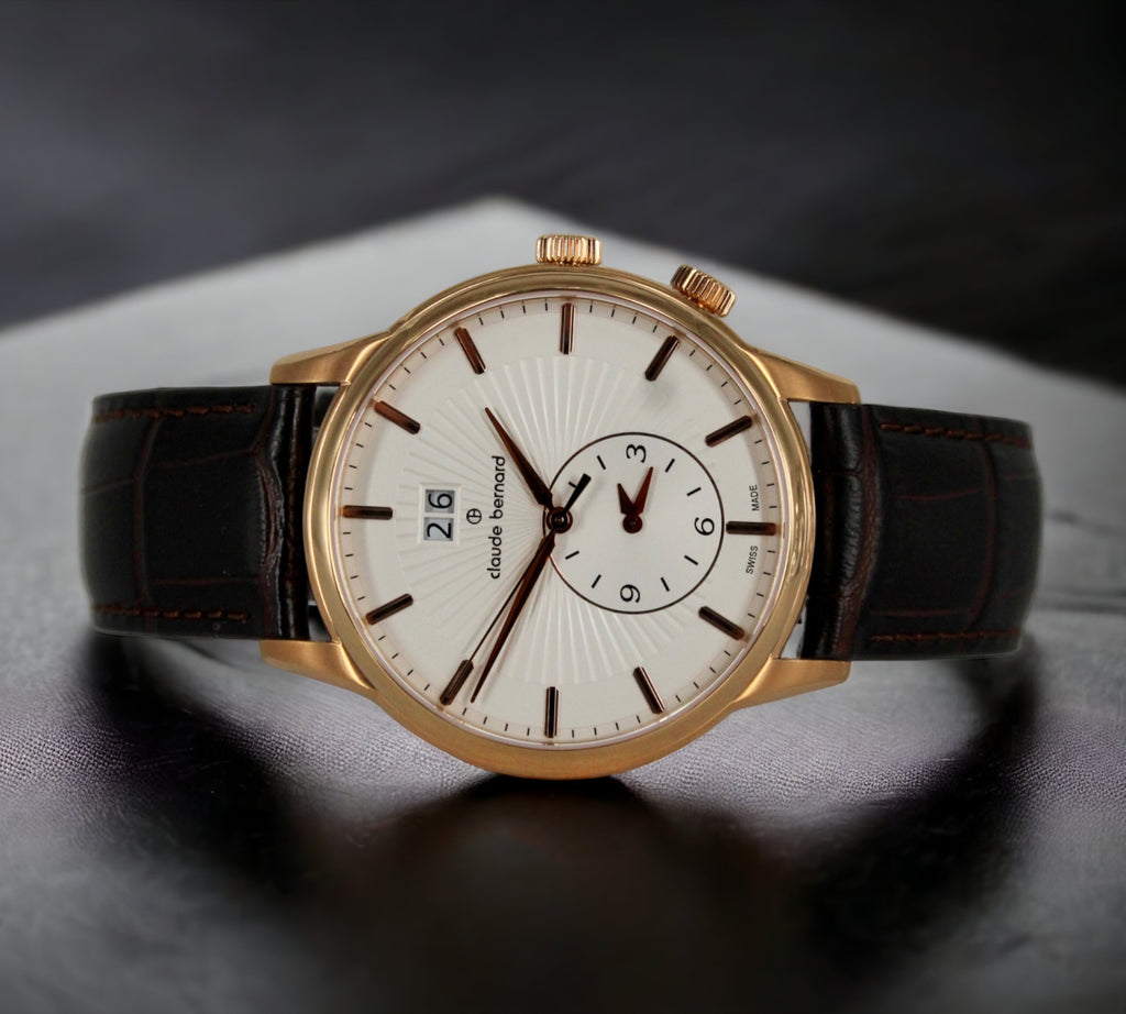 Claude Bernard Herenhorloge 62007-37R-AIR heeft een roségoud PVD horlogekast en een bruine leren armband.Dit horloge combineert een klassieke en elegante uitstraling met moderne functies. Verkrijgbaar bij optiwatch