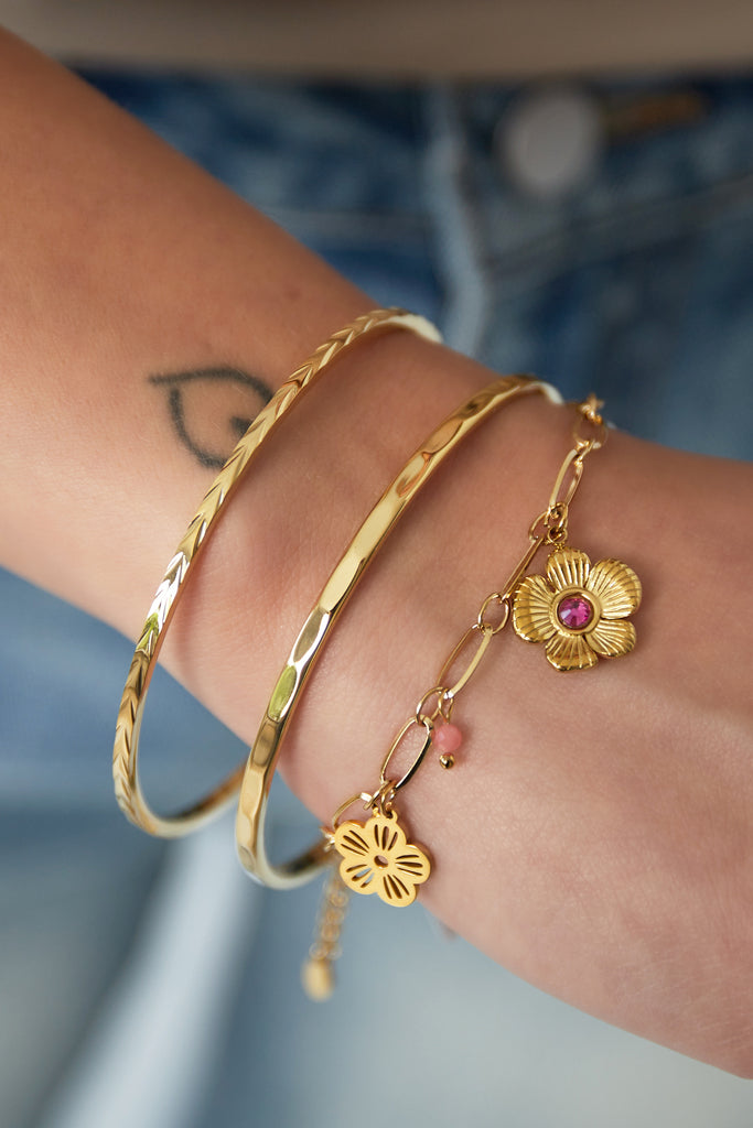 Eenvoudige gevlochten armband, goudkleurige armband dames. Verkrijgbaar bij Optiwatch.nl